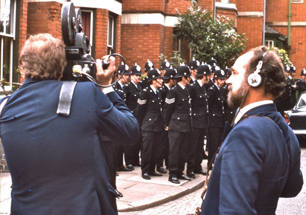 cameraman and soundman filming police in leicester, england, 1974